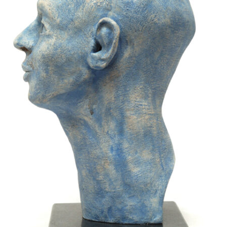 Blue Head, glazed stoneware on a marble base.